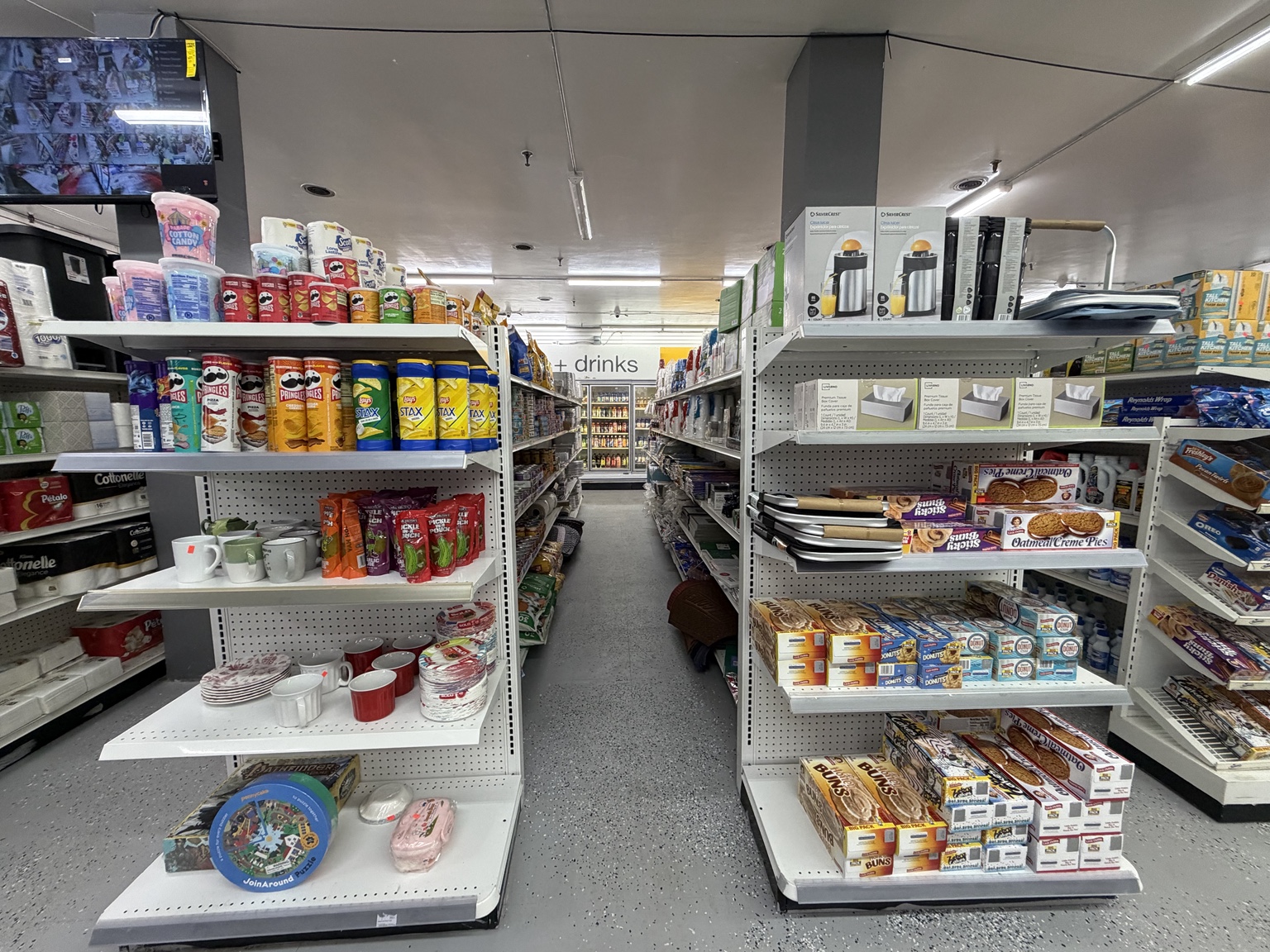 Household supplies and groceries inside the market