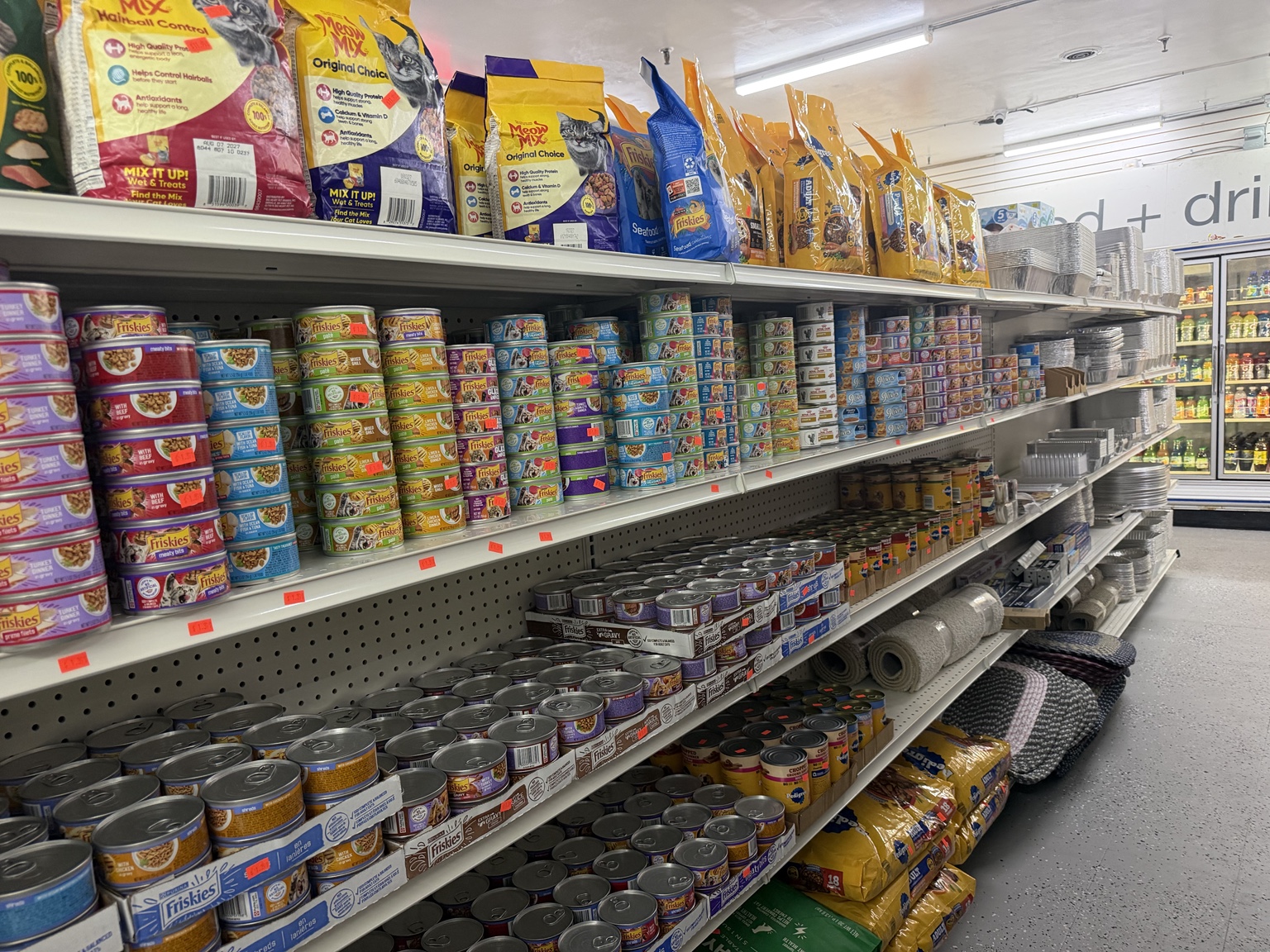 Shelves of canned foods, rice and pantry groceries